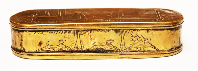 A brass 17th C. Dutch tobacco box with a naughty text.