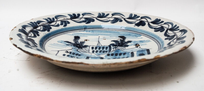 A large Delft blue early seventeenth century dish.