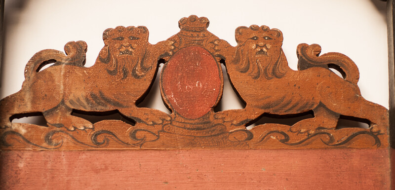 A nineteenth century childs push sled of Geesje de Vries with the coat of arms of Enkhuizen.