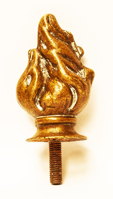 A nineteenth century solid brass top ornament.