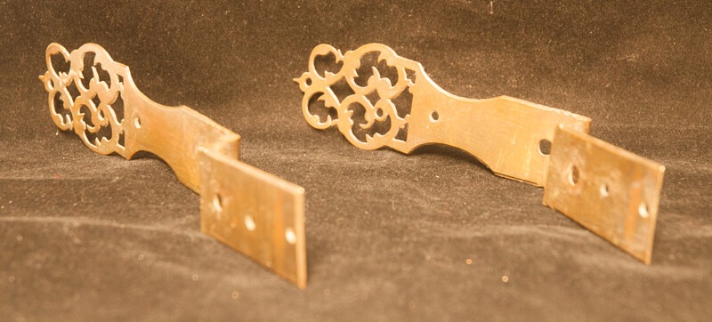 A pair of decorative eighteenth century brass 