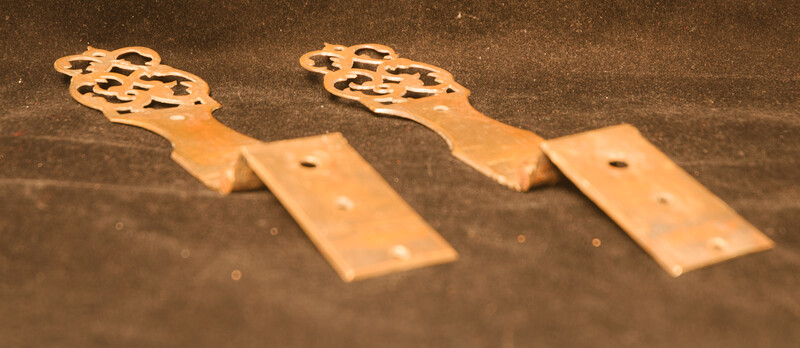 A pair of decorative eighteenth century brass 