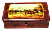 A paper mache tobacco box with a beautifully painted landscape with horses.