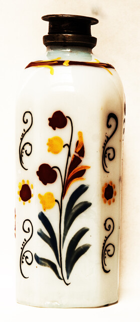 A rare eightteenth century opaline Bohemian bottle with cold enamel painting of flowers and a heart with two doves. With original pewter screw on top.