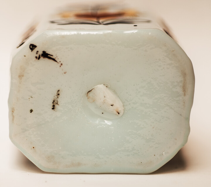 A rare eightteenth century opaline Bohemian bottle with cold enamel painting of flowers and a heart with two doves. With original pewter screw on top.