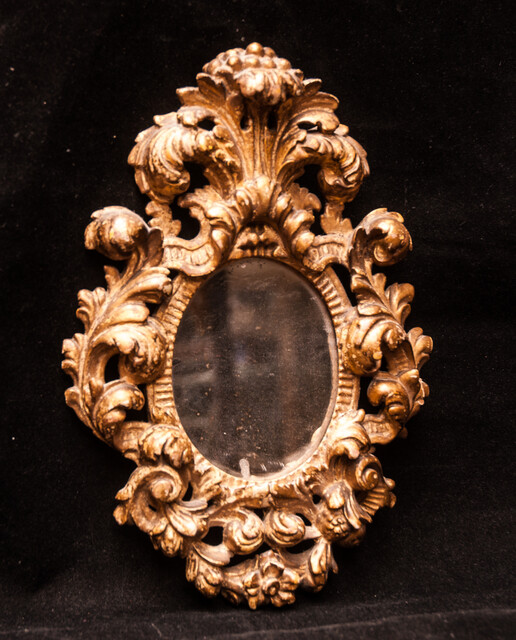 A seventeenth century Dutch mercury mirror in a gilt frame.