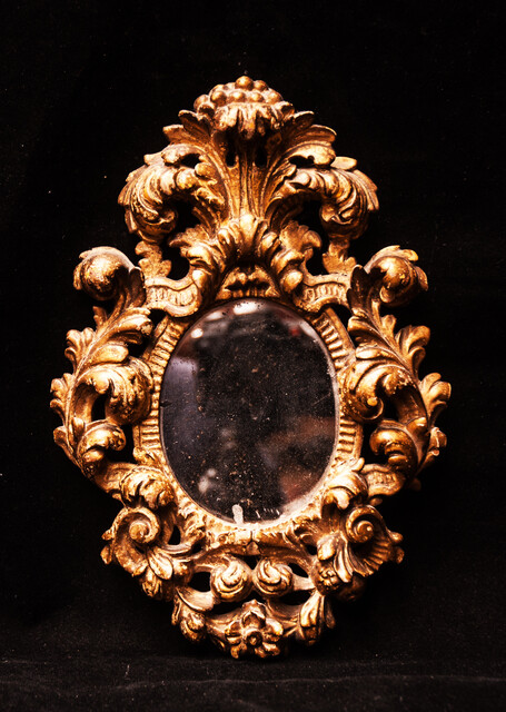 A seventeenth century Dutch mercury mirror in a gilt frame.