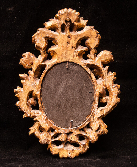 A seventeenth century Dutch mercury mirror in a gilt frame.