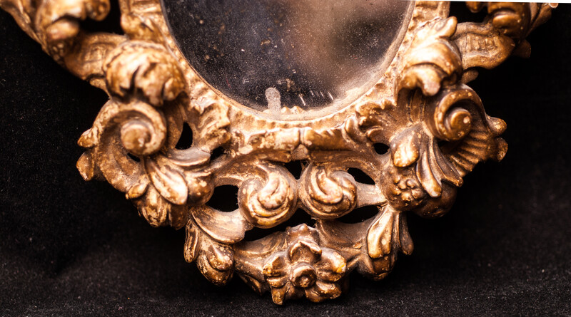 A seventeenth century Dutch mercury mirror in a gilt frame.