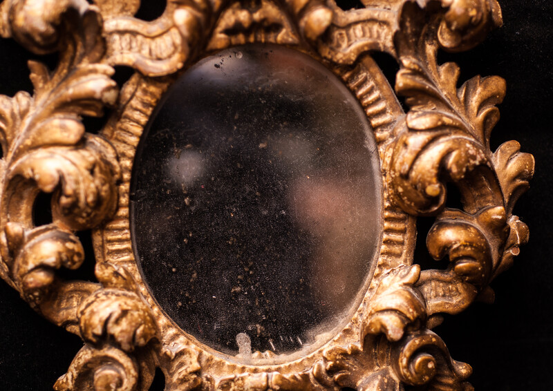 A seventeenth century Dutch mercury mirror in a gilt frame.