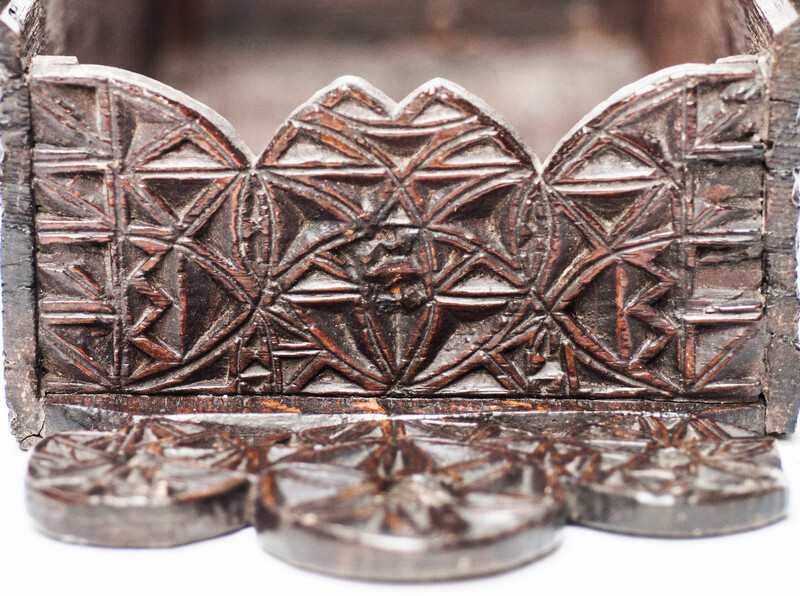 A seventeenth century Frisian oak candlebox with elaborate 