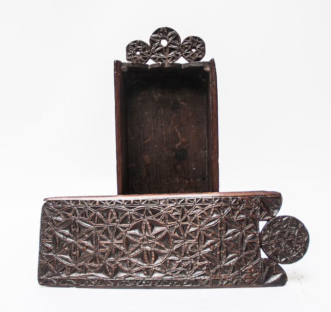 A seventeenth century Frisian oak candlebox with elaborate 