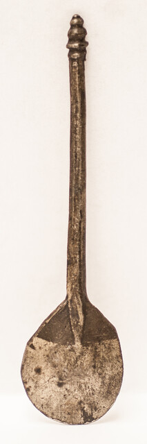 A small 17th century pewter spoon with a clear hallmark 