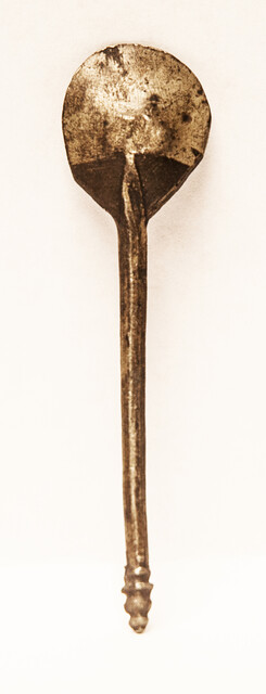 A small 17th century pewter spoon with a clear hallmark 