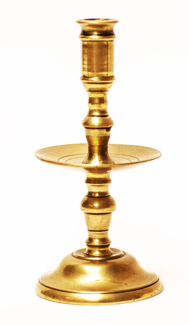 A small eighteenth century brass candlestick.