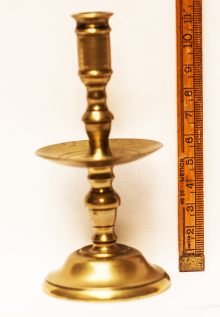 A small eighteenth century brass candlestick.