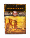 An 18th century French lacquered metal perfume bottle container decorated with four nicely painted classical landscapes.