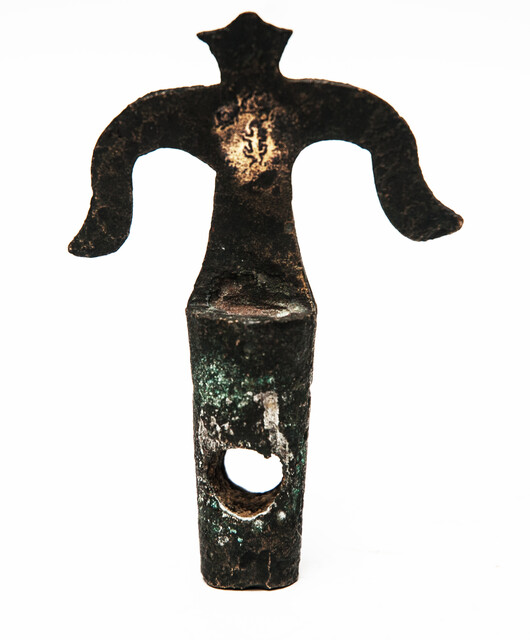 An early seventeenth century bronze faucet stop with a clear makers mark.