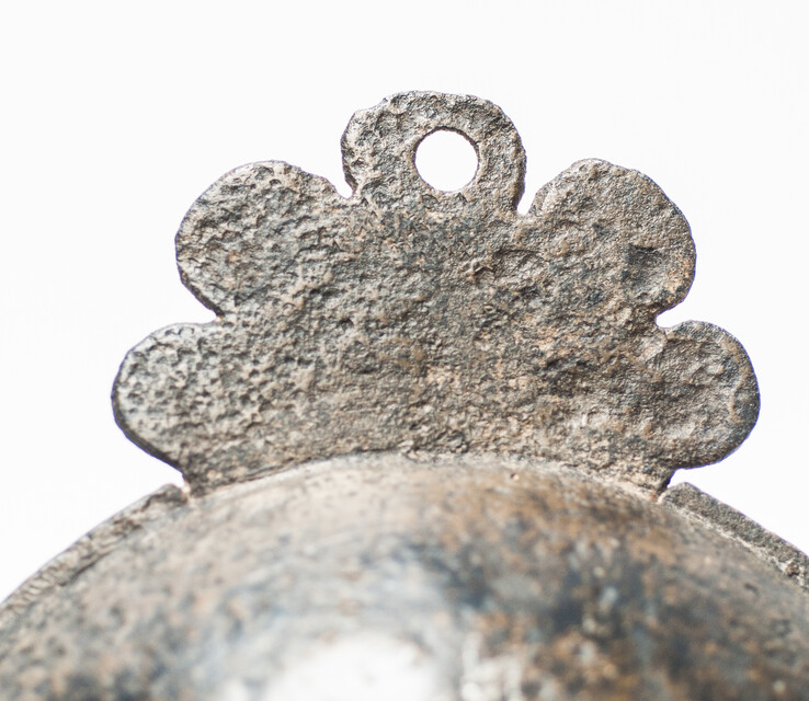 An early seventeenth century pewter porridge bowl with a rose hallmark.