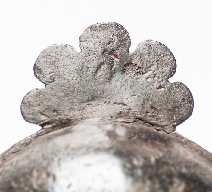 An early seventeenth century pewter porridge bowl with a rose hallmark.