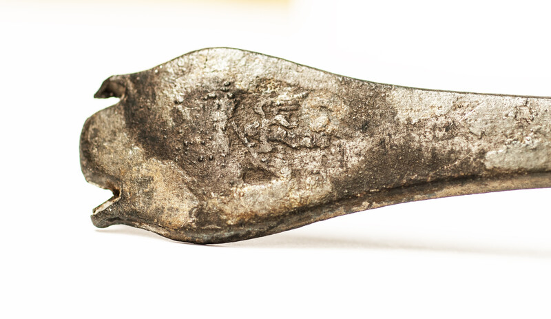 An early seventeenth century pewter spoon with hallmark.