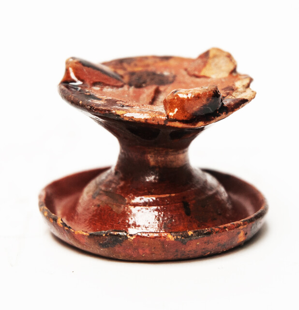 An earthenware 17th C. toy salt cup.