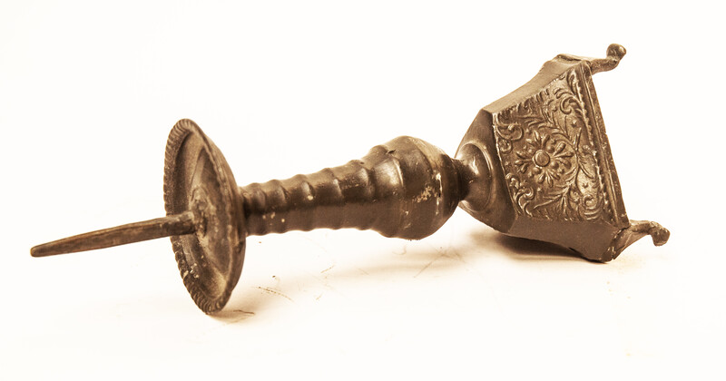 An eighteenth century Dutch pewter religious candlestick.