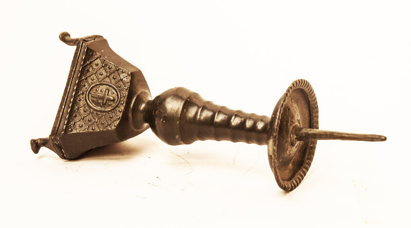 An eighteenth century Dutch pewter religious candlestick.