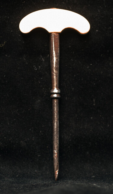 An eighteenth century hand drill with a bone handle.