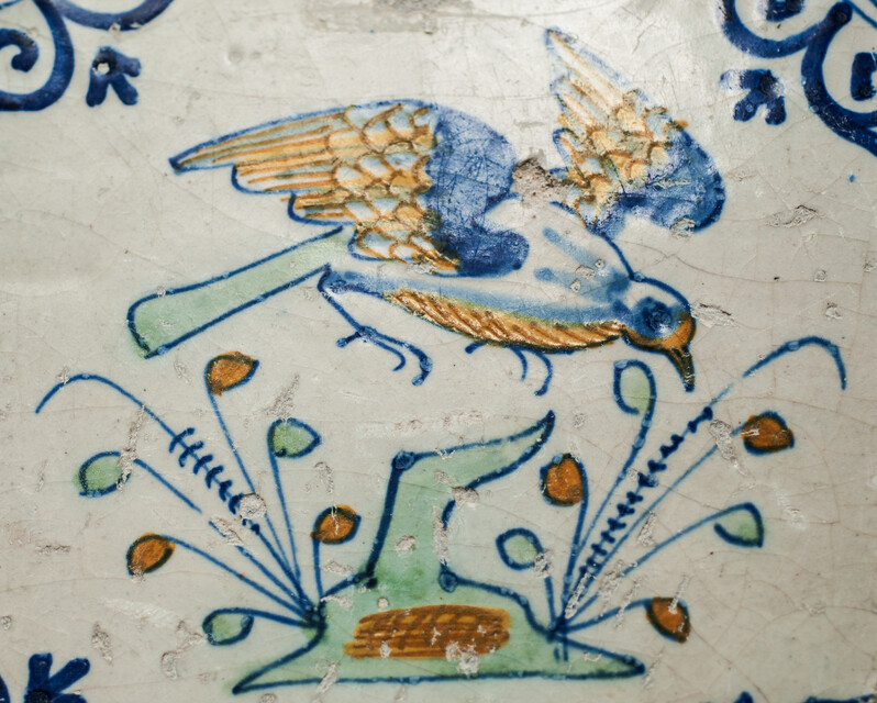 Eight very rare early 17th C Delft coloured tiles with birds.